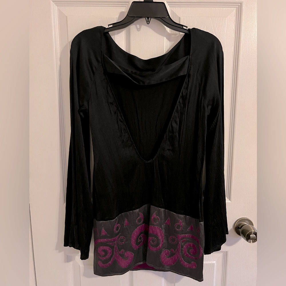 Satin like dress with purple borders and lace